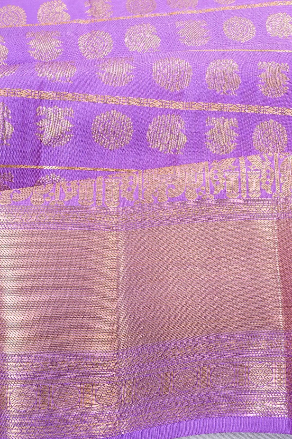 Taranga Kanchi Silk Vertical Lines And Butta Lavender Saree