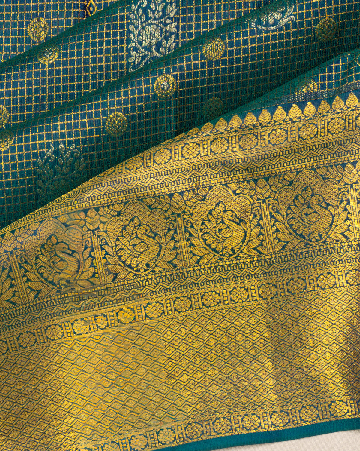 Taranga Kanchi Silk Checks And Butta Teal Blue Saree