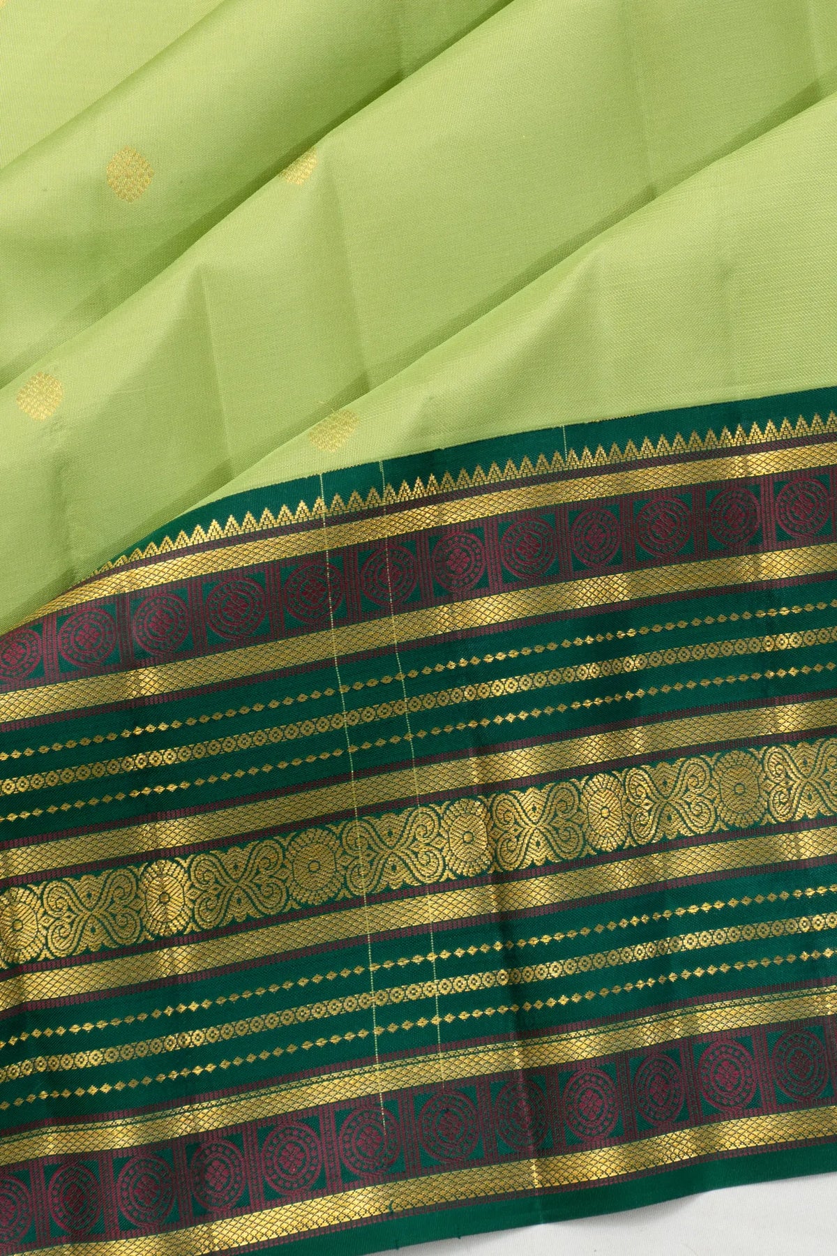 Taranga Kanchi Silk Butta Pista Green Saree