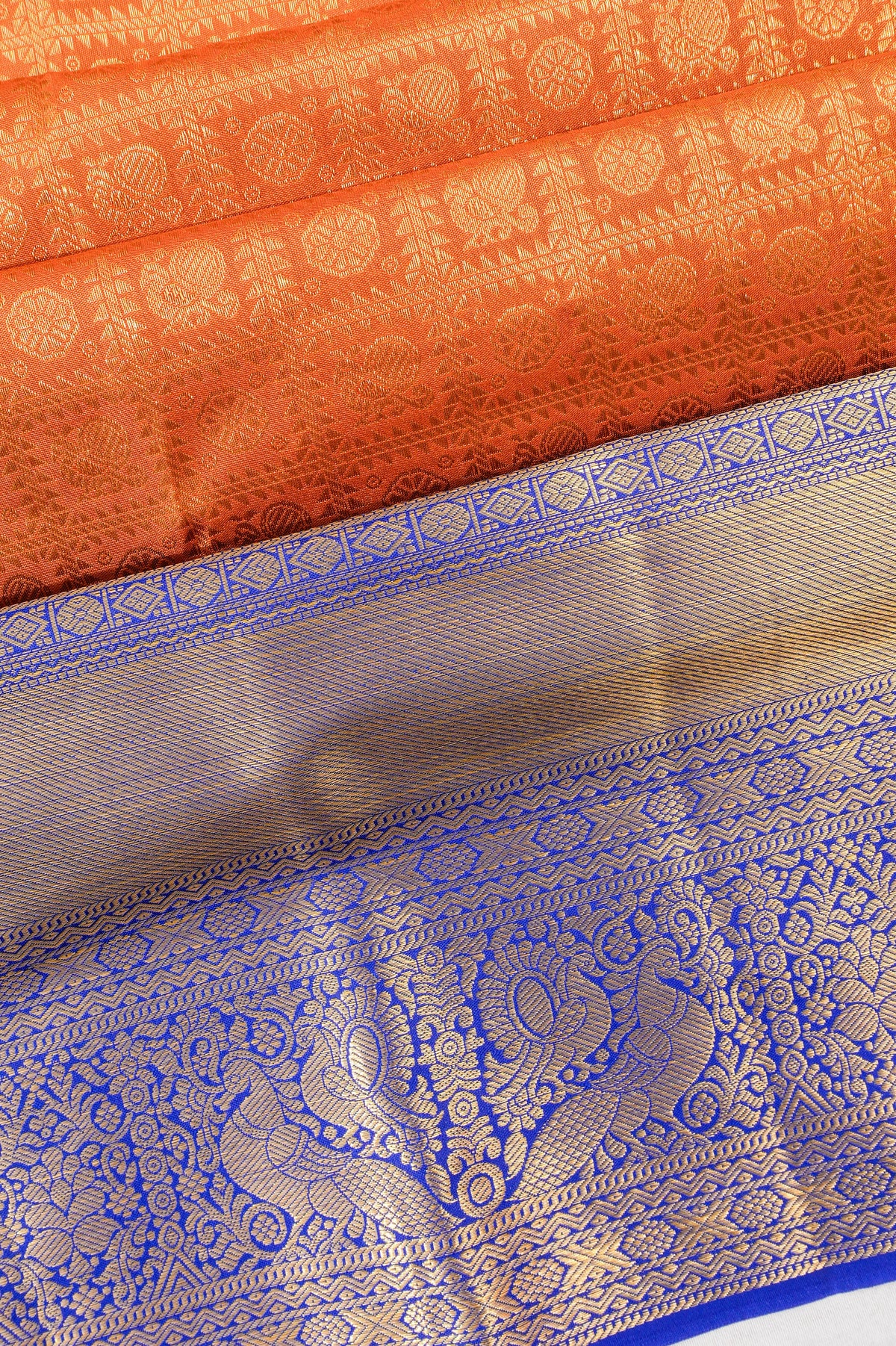 Taranga Kanchi Silk Checks And Butta Orange Saree