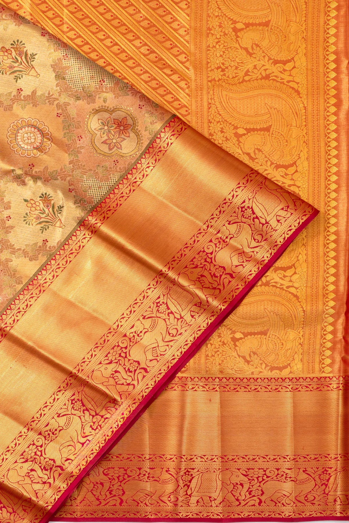 Taranga Kanchi Silk Tissue Jaal And Butta Gold Saree