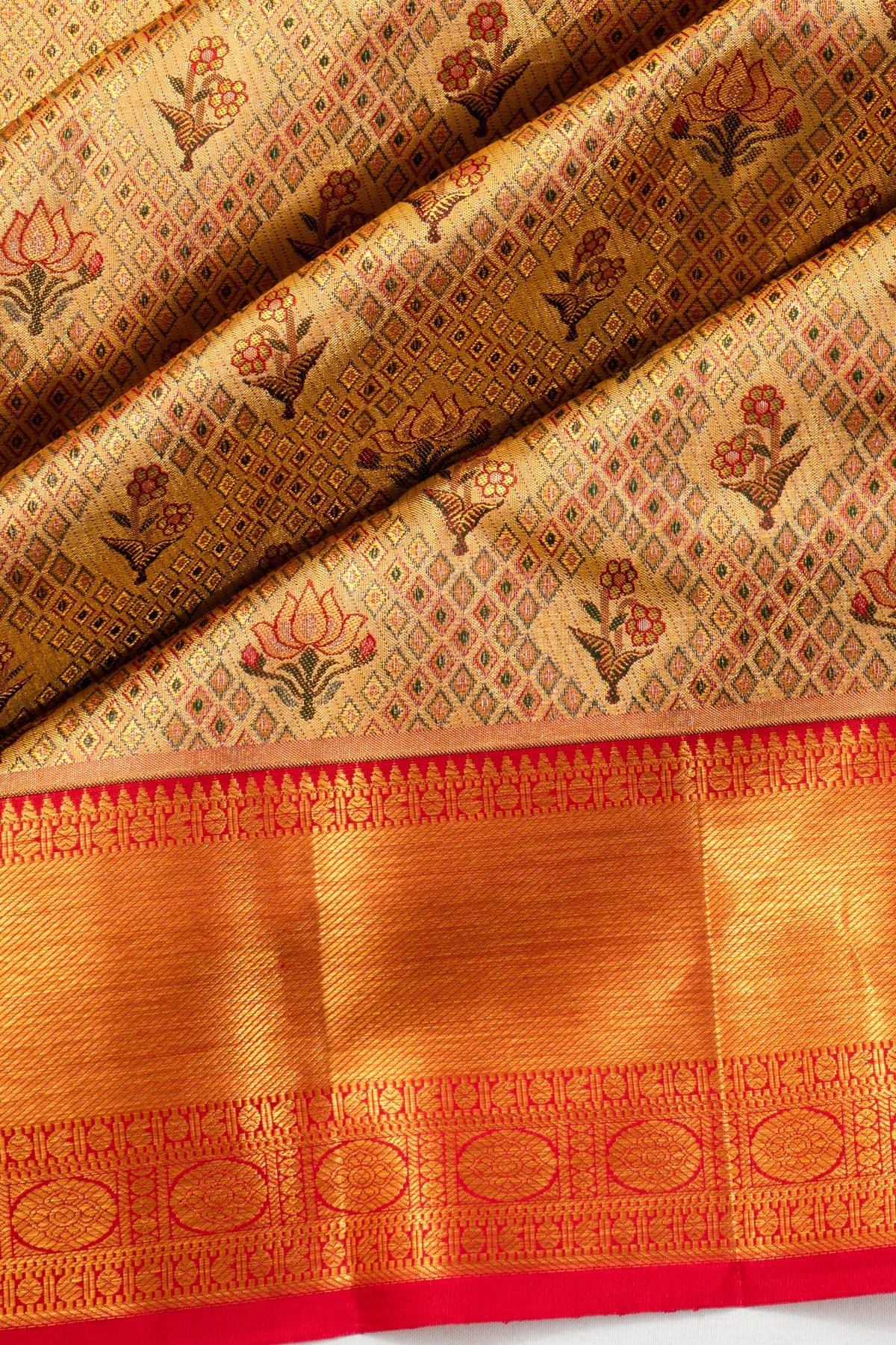 Taranga Kanchi Silk Tissue Brocade Gold Saree
