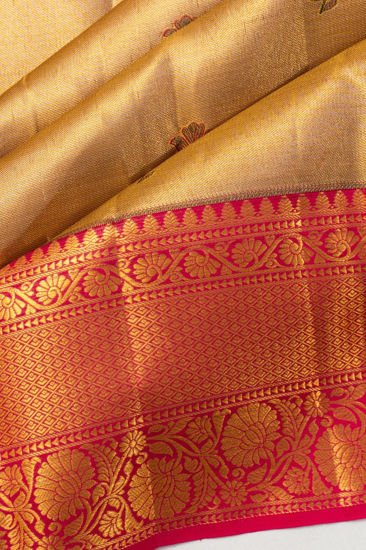 Taranga Kanchi Silk Tissue Butta Gold Saree