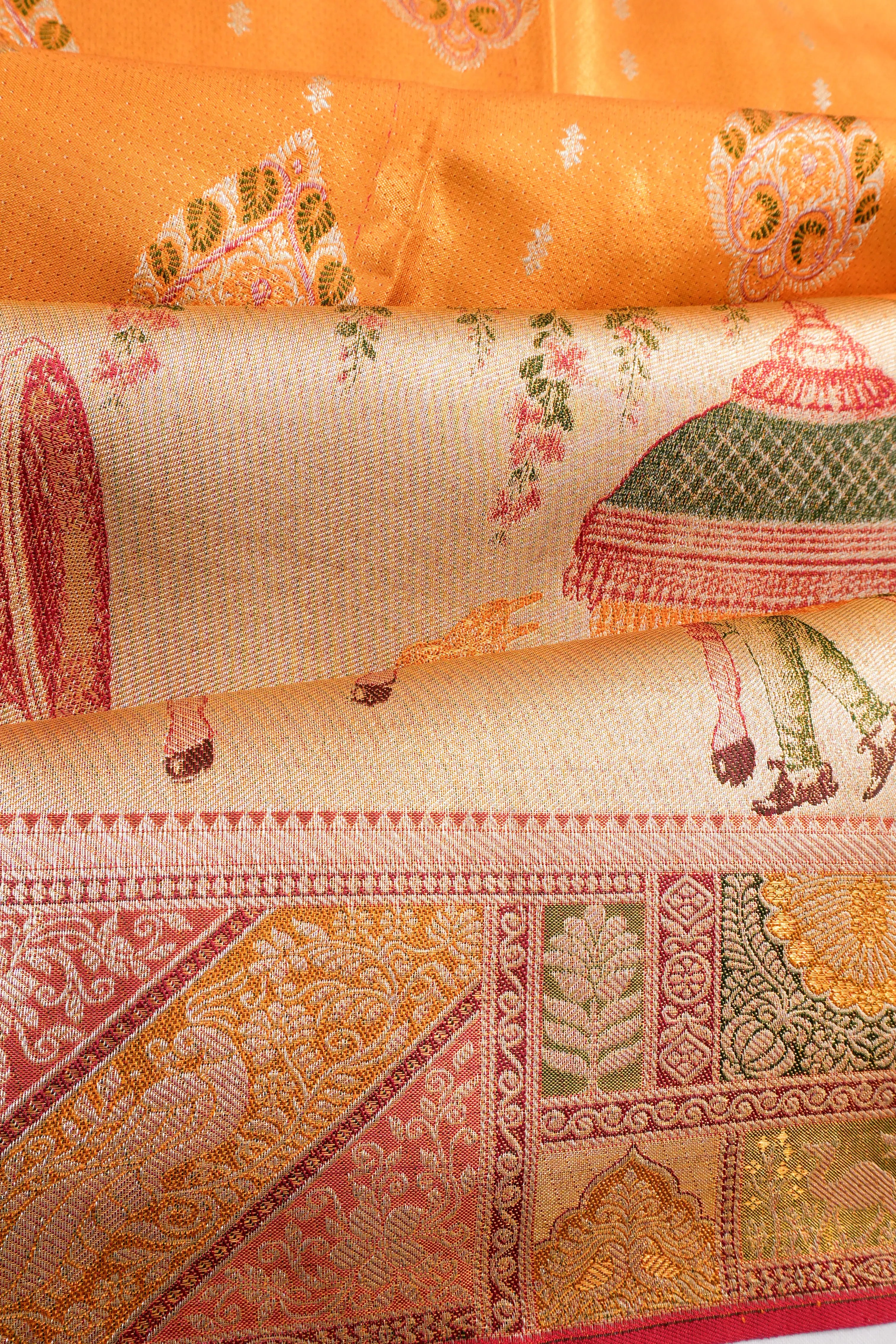 Taranga Kanchi Silk Tissue Brocade Yellow Saree With Very Big Border