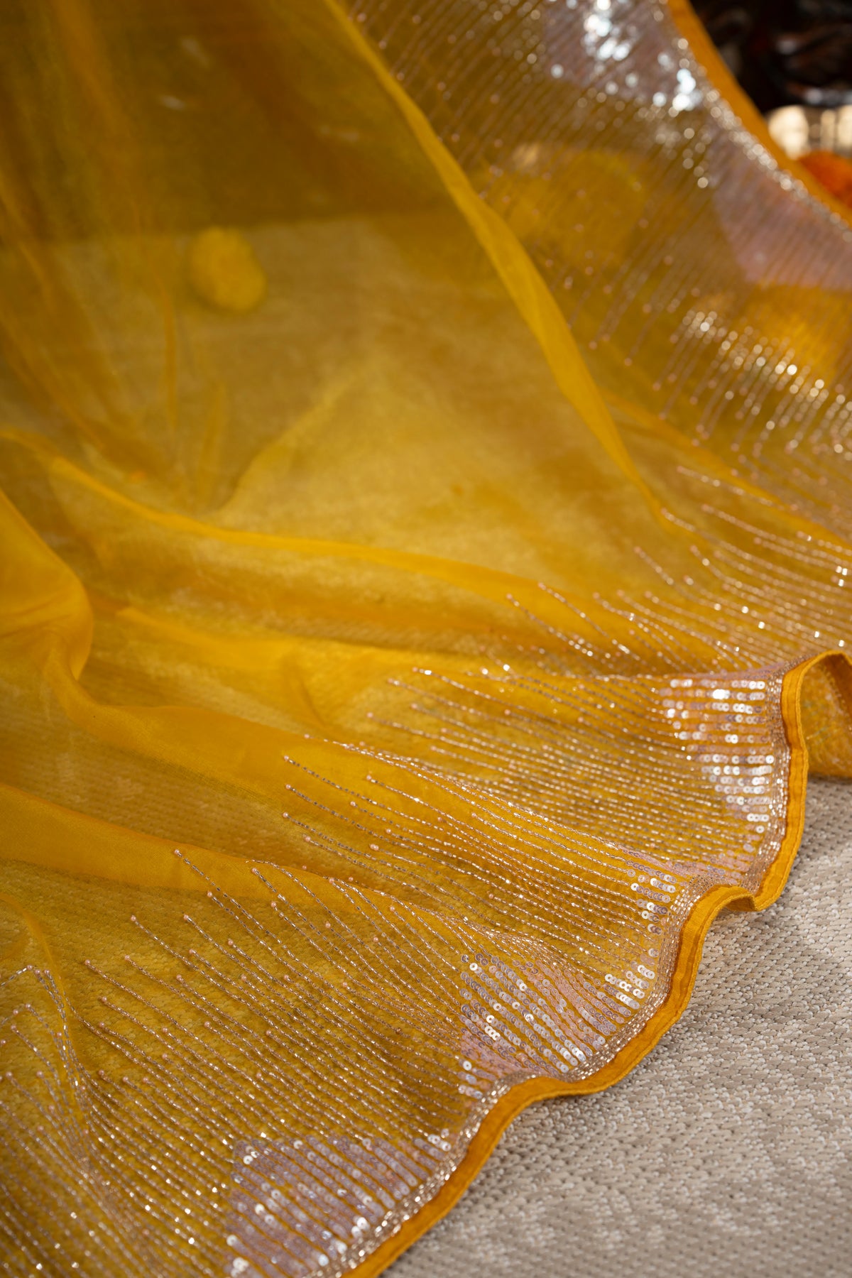 Georgette Plain Yellow Saree With Beads And Sequin Work Border