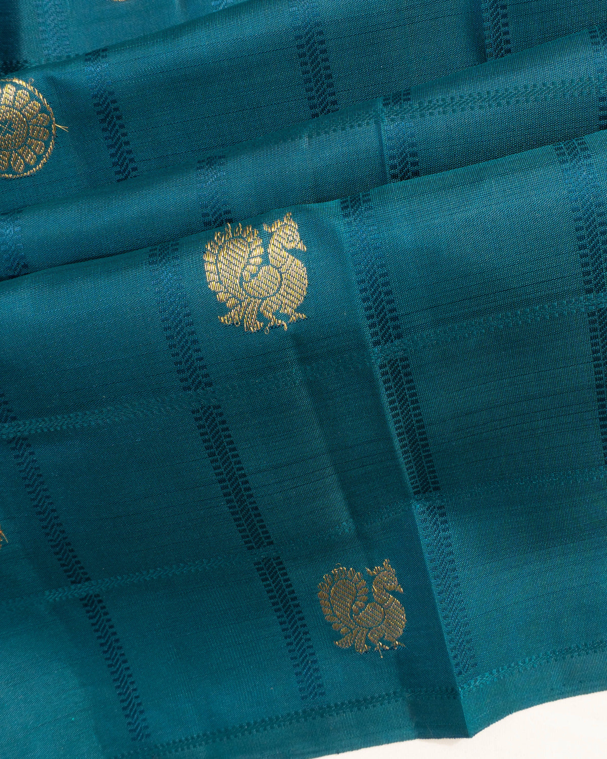 Taranga Kanchi Silk Checks And Butta Teal Green Saree