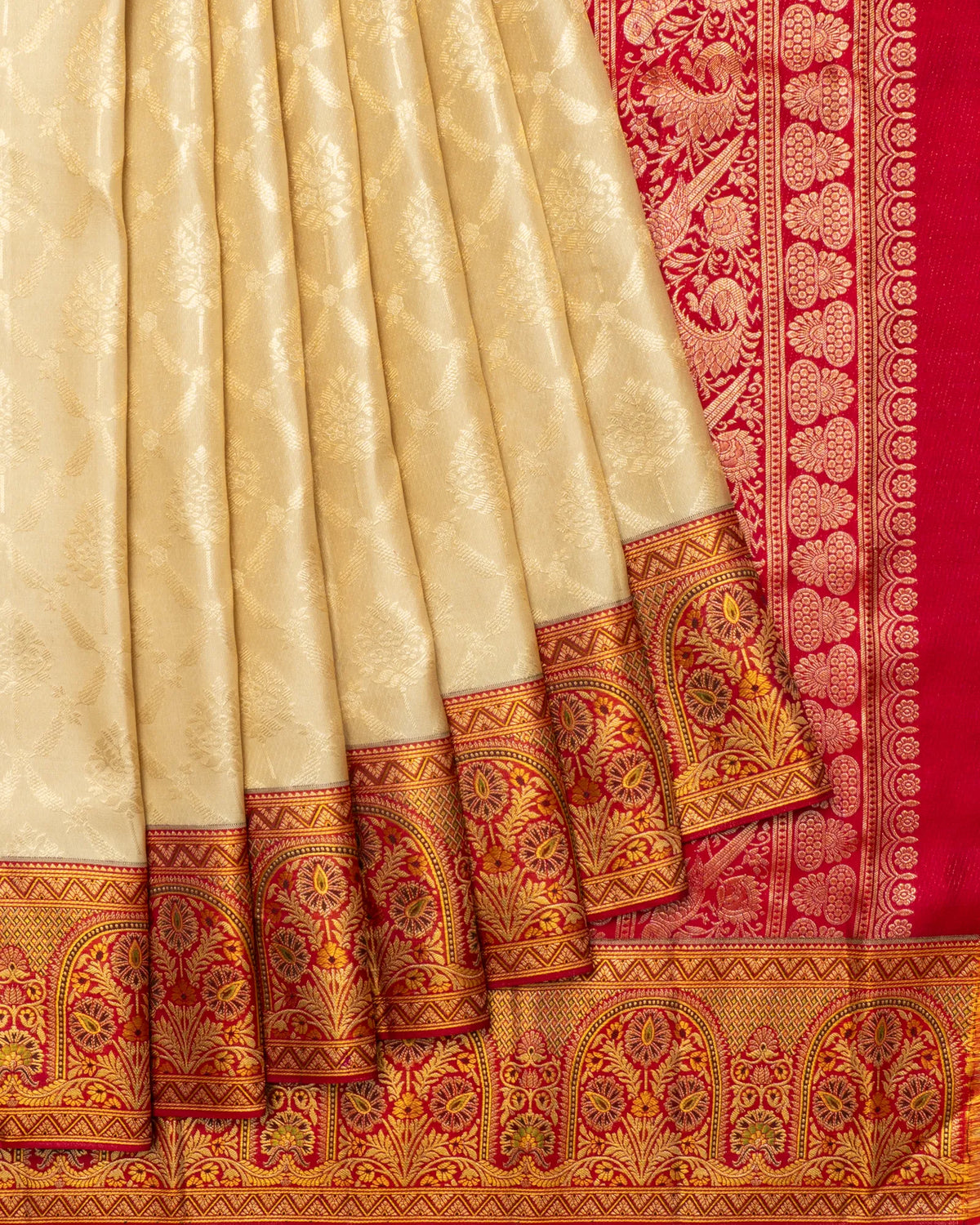 Kanchipuram Silk Jaal And Butta Cream Saree