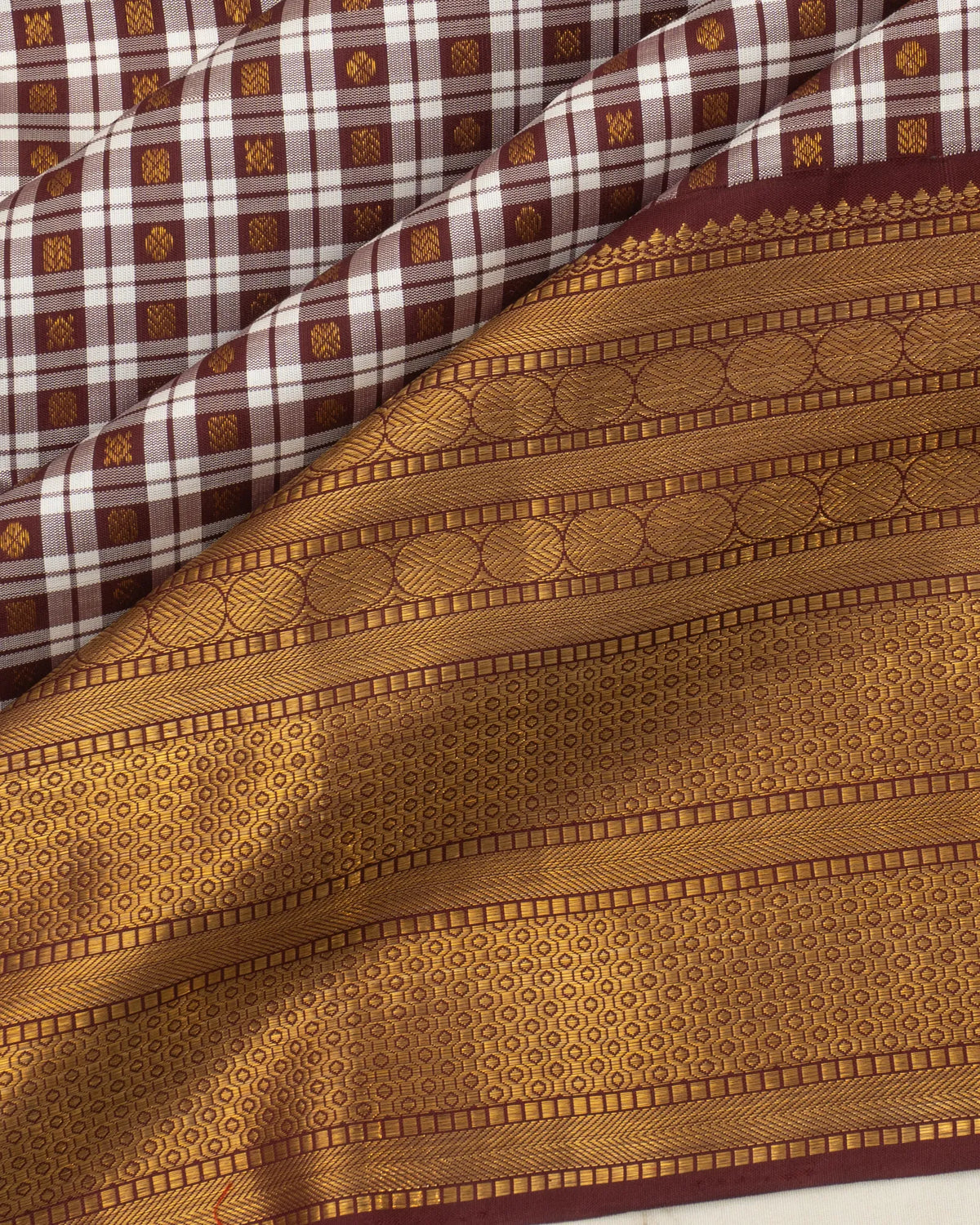 Classic Kanchipuram Silk Checks And Butta White And Maroon Saree