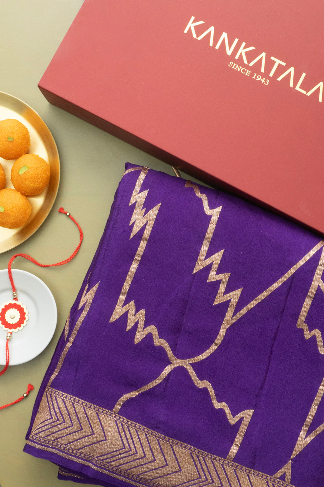 Georgette Geometrical Jaal Purple Saree WIth Rakhi