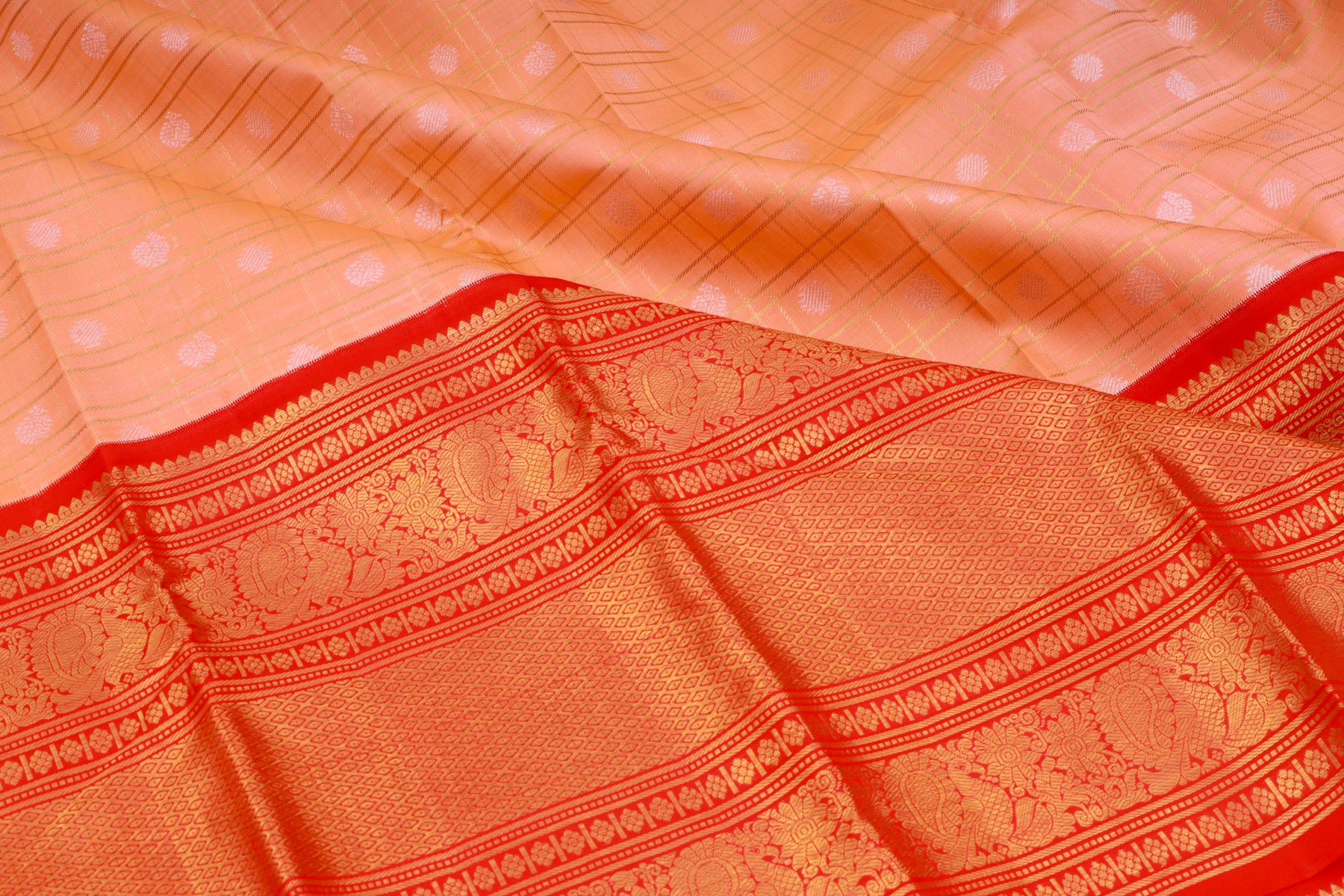 Kanchipuram Silk Checks And Butta Pastel Orange Saree