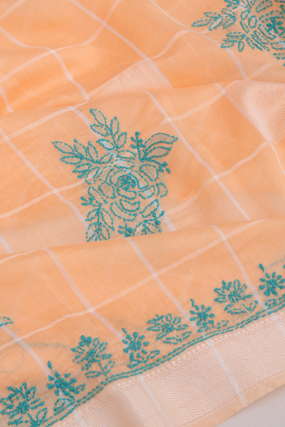 Maheshwari Silk Checks And Chikankari Butta Pastel Orange Saree