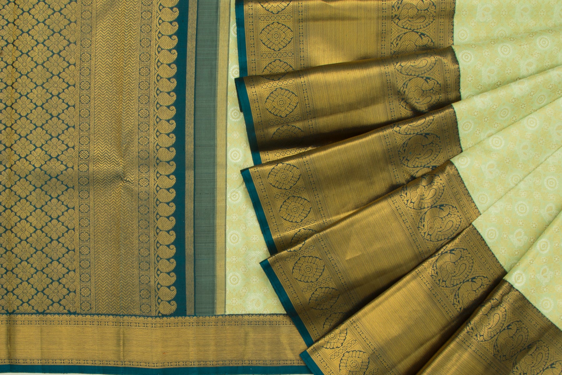 Kanchipuram Silk Criss-Cross Checks And Butta Pastel Green Saree