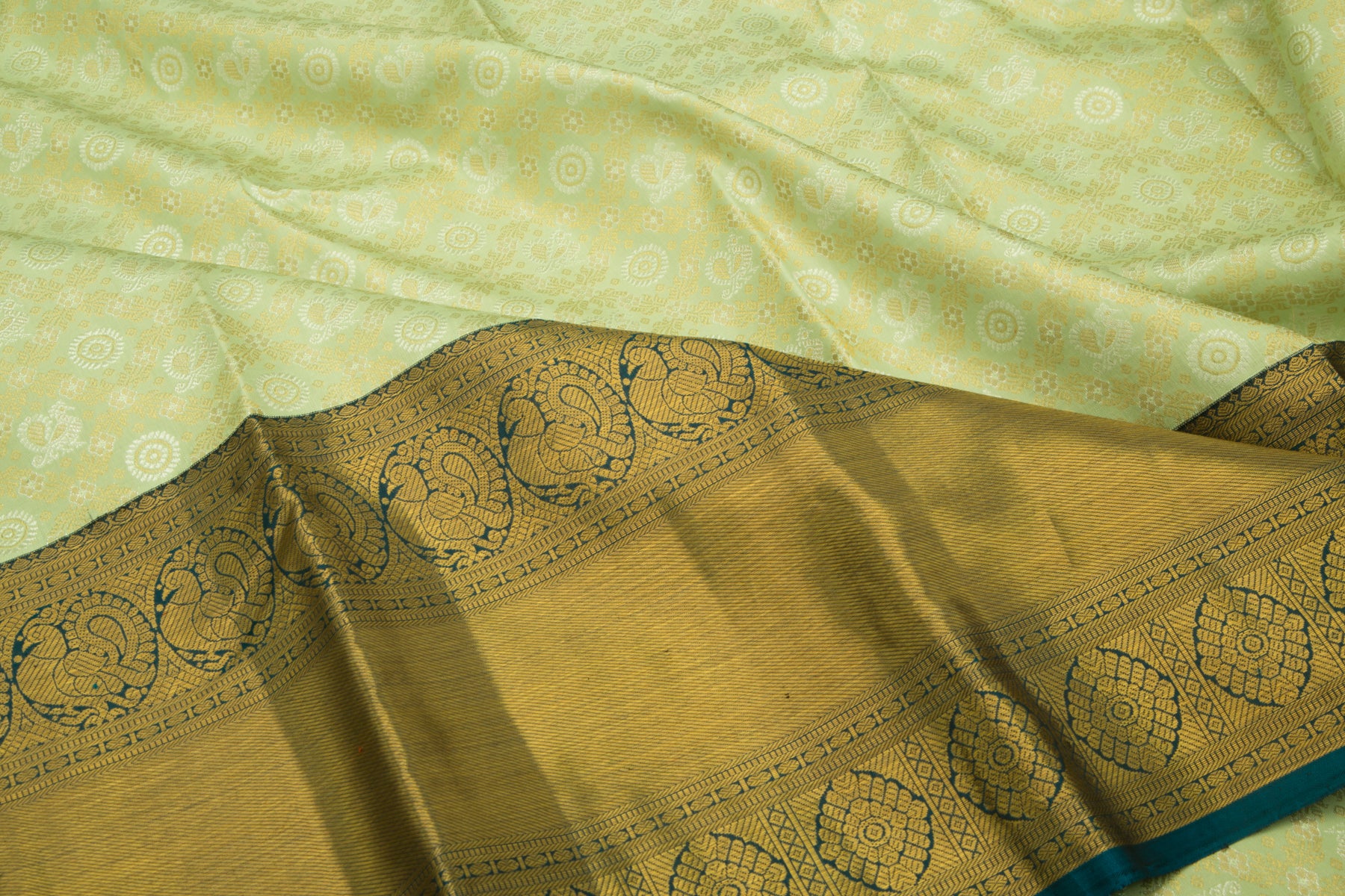 Kanchipuram Silk Criss-Cross Checks And Butta Pastel Green Saree