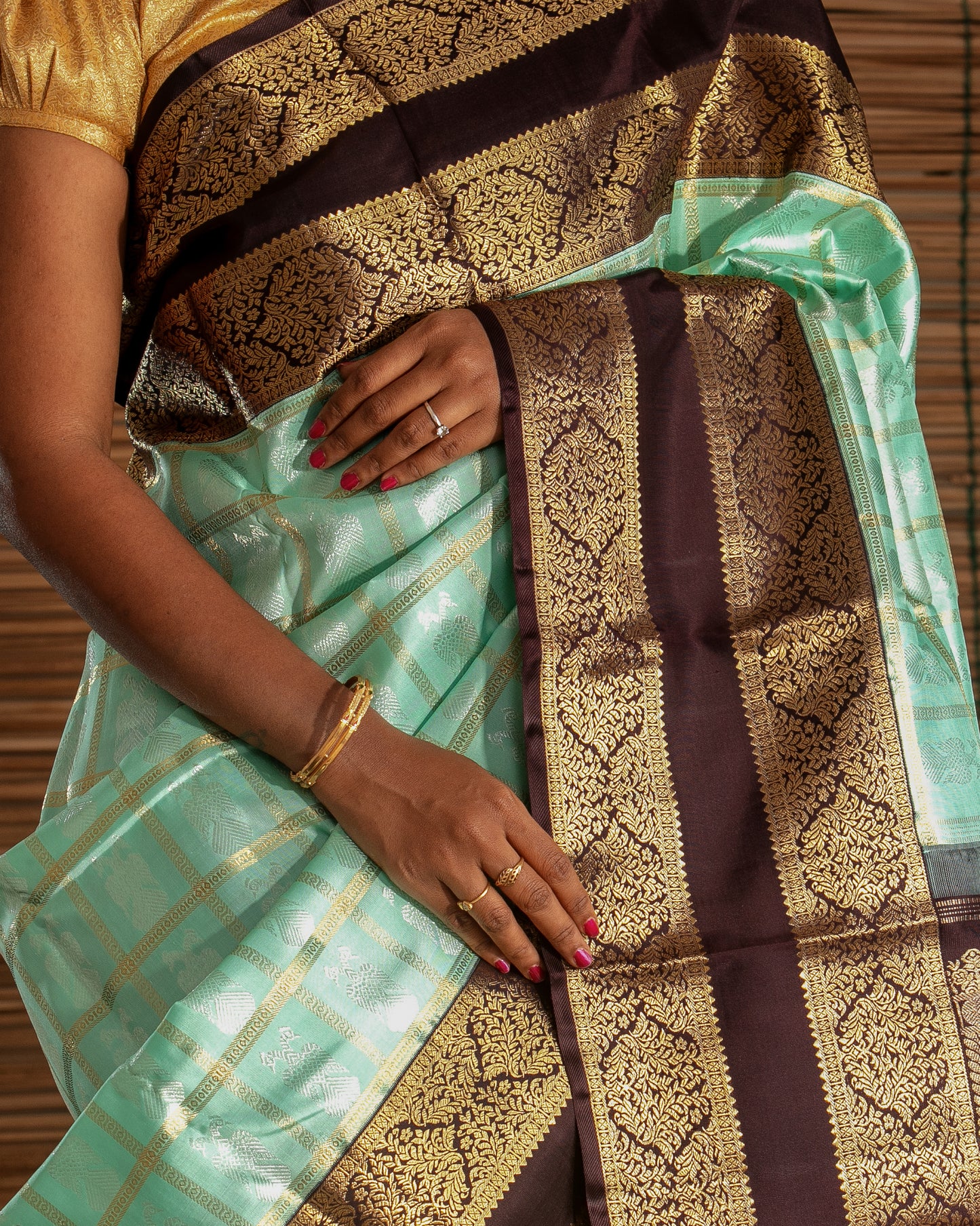 Kanchipuram Silk Checks And Butta Green Saree