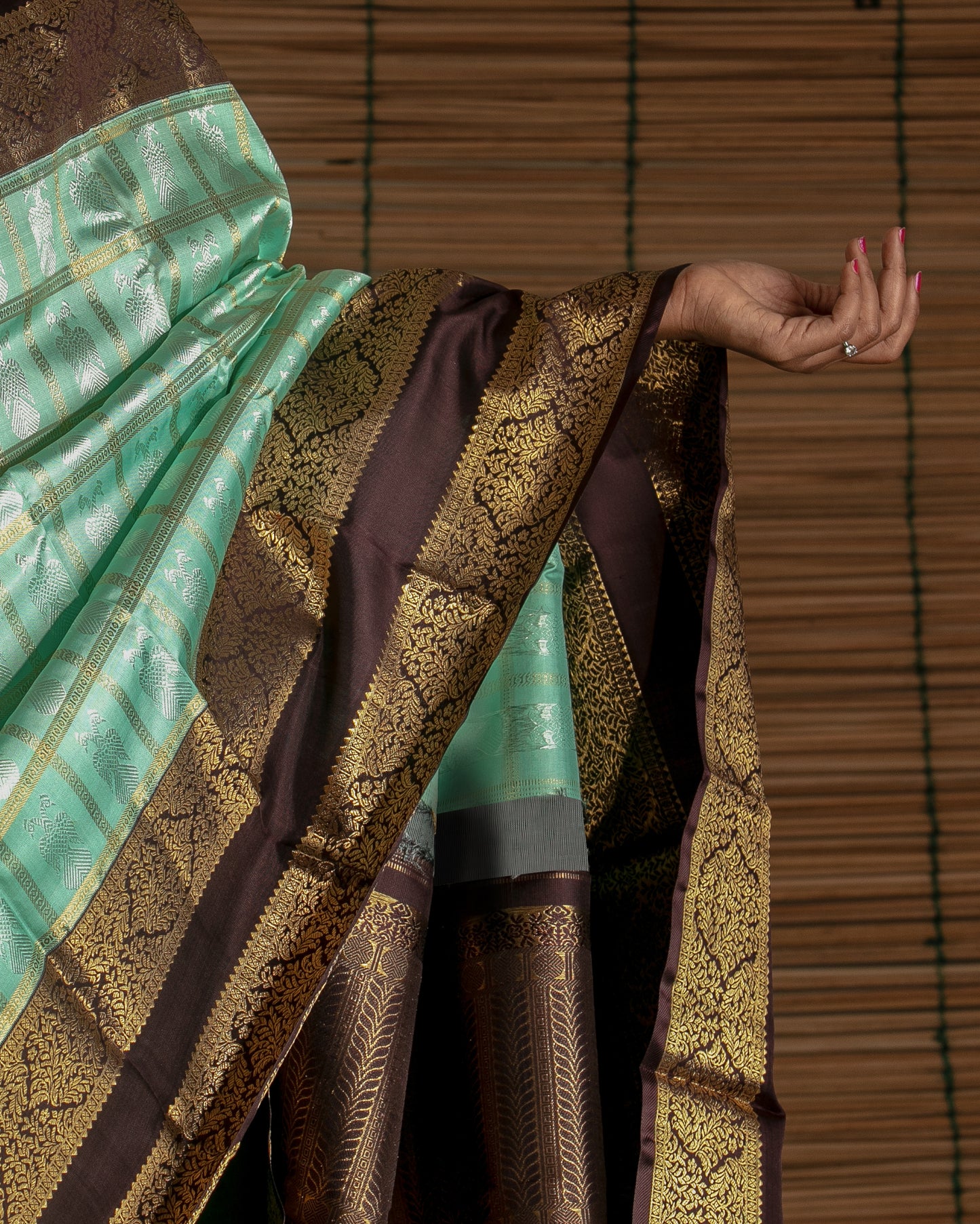 Kanchipuram Silk Checks And Butta Green Saree