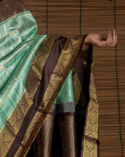 Kanchipuram Silk Checks And Butta Green Saree