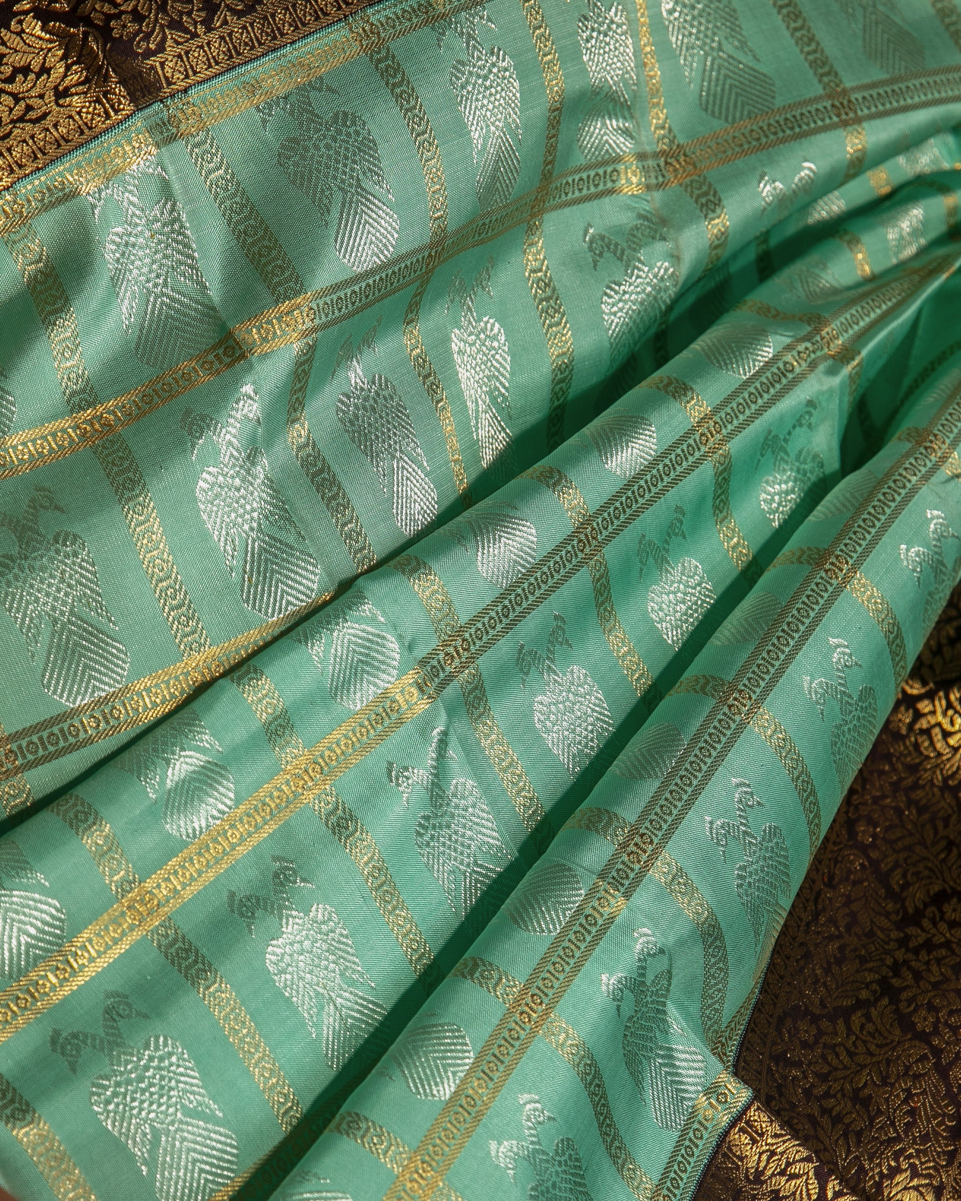 Kanchipuram Silk Checks And Butta Green Saree