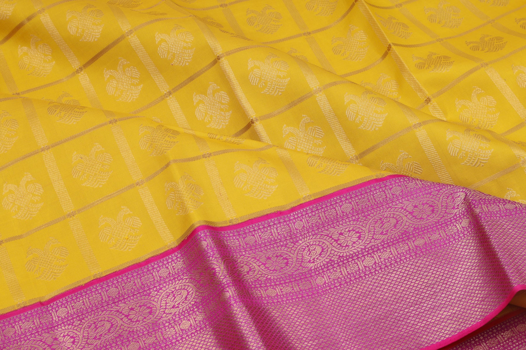 Kanchipuram Silk Checks And Butta Yellow Saree