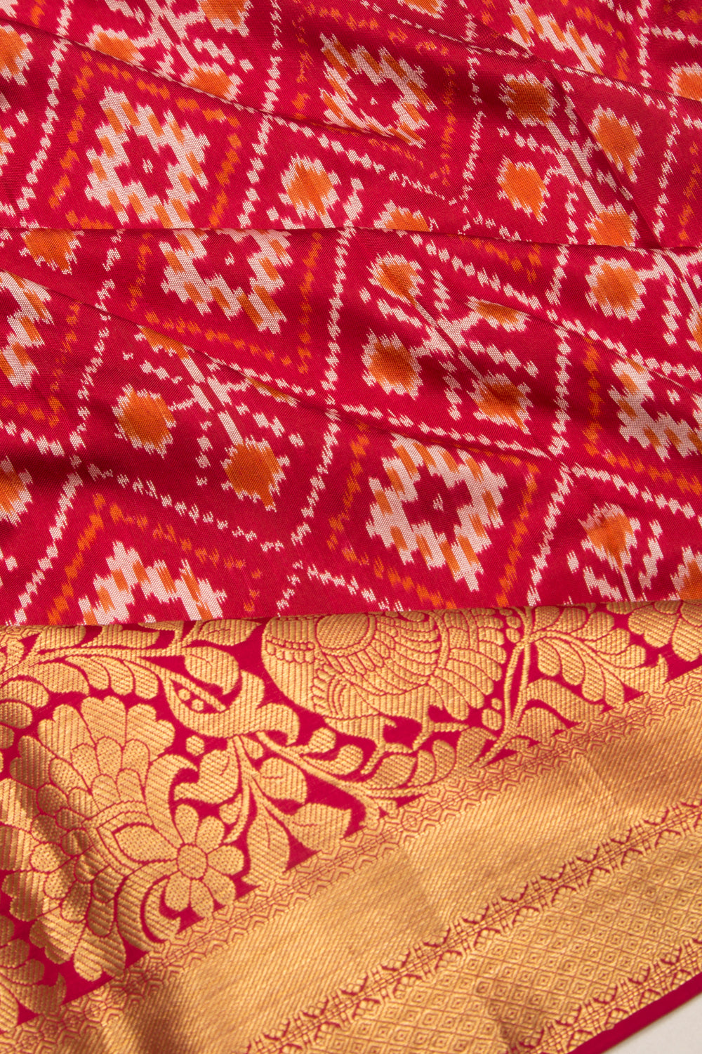 Kanchipuram Silk Ikat And Bandhani Pink And Black Saree