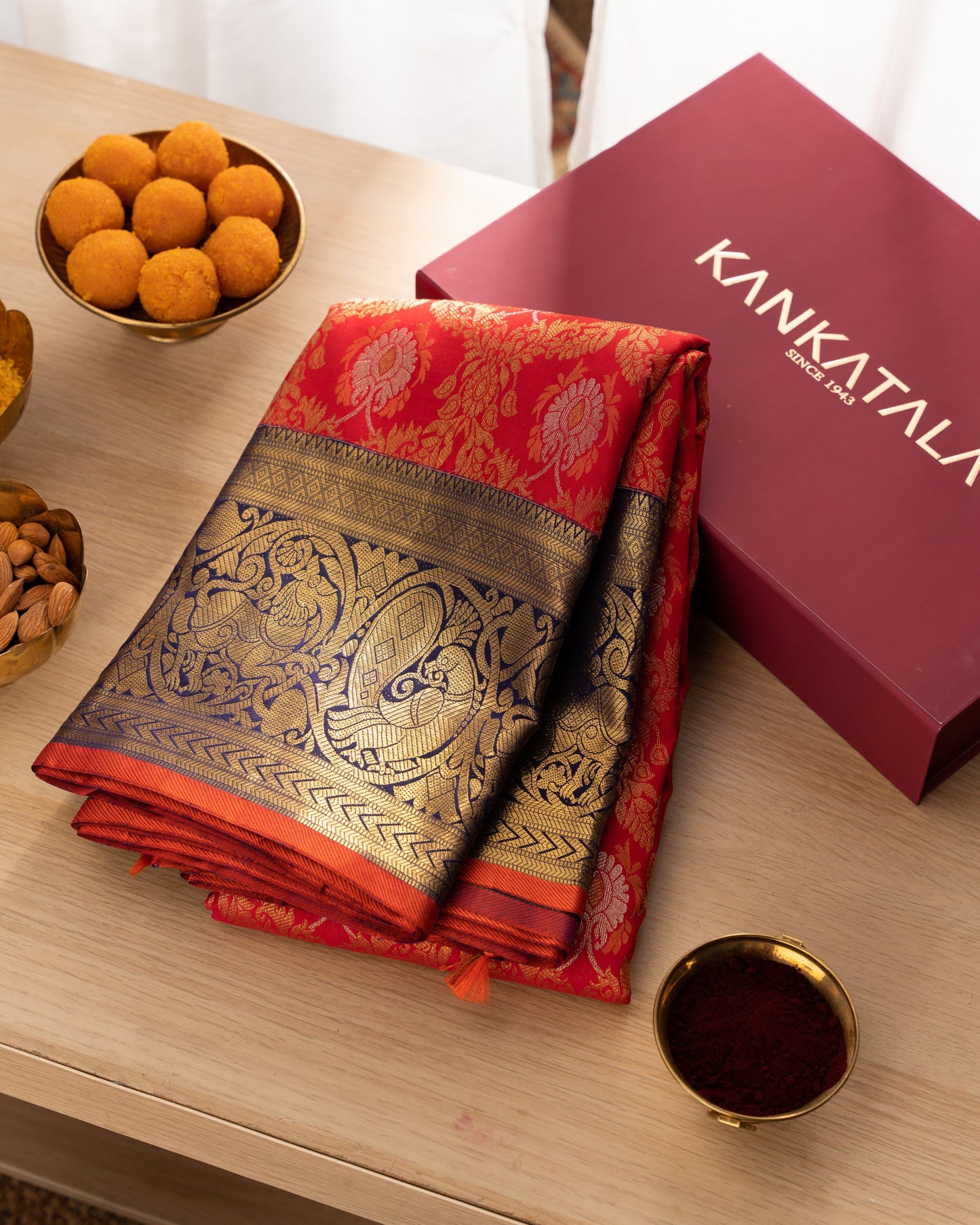 Kanchipuram Silk Jaal and Butta Red Saree