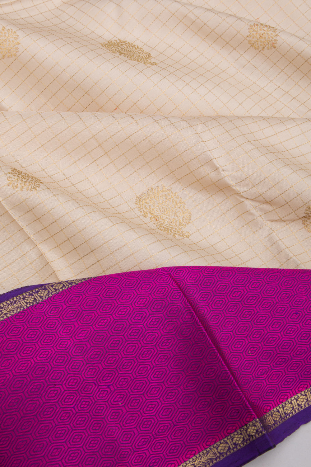 Kanchipuram Silk Checks And Butta Cream Saree