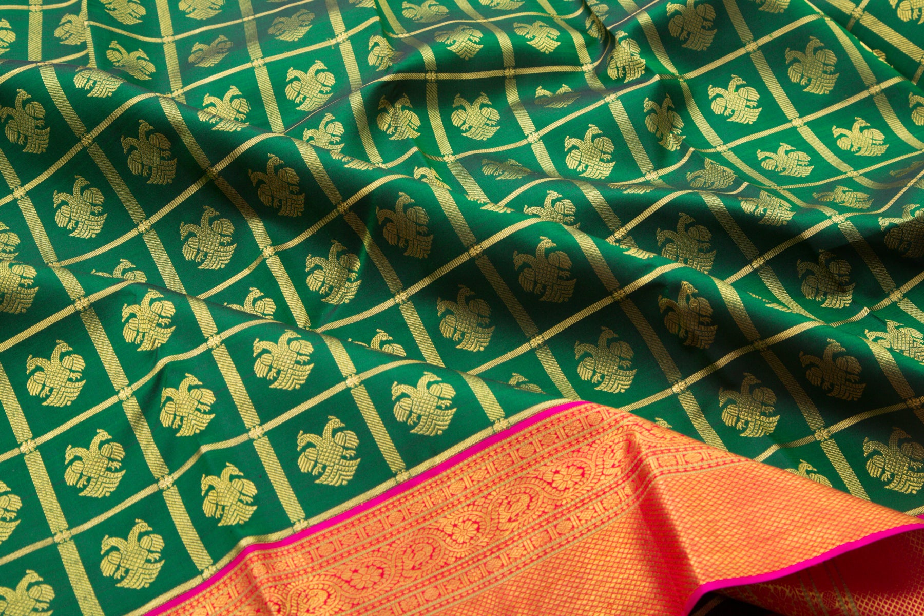 Kanchipuram Silk Checks And Butta Bottle Green Saree