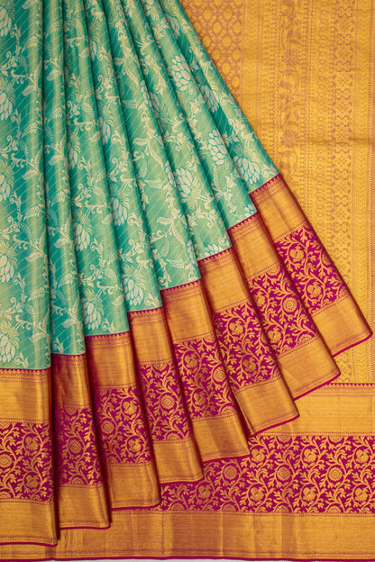 Taranga Kanchi Silk Tissue Jaal Green Saree