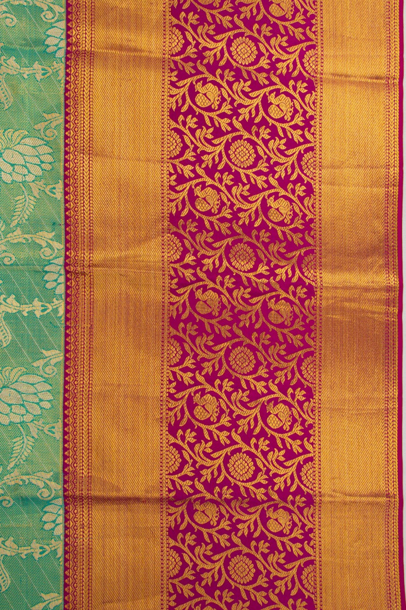 Taranga Kanchi Silk Tissue Jaal Green Saree
