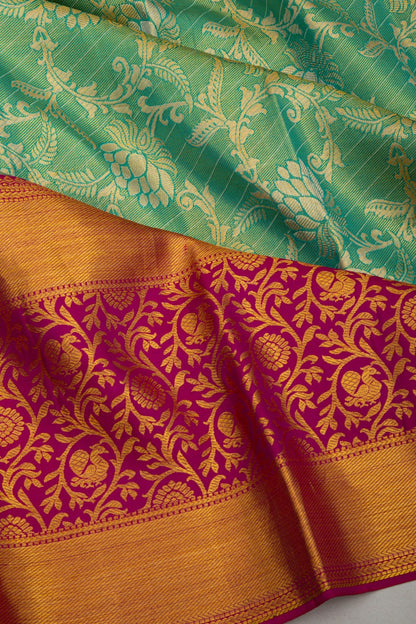 Taranga Kanchi Silk Tissue Jaal Green Saree