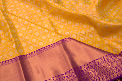 Taranga Kanchi Silk Tissue Brocade Yellow Saree