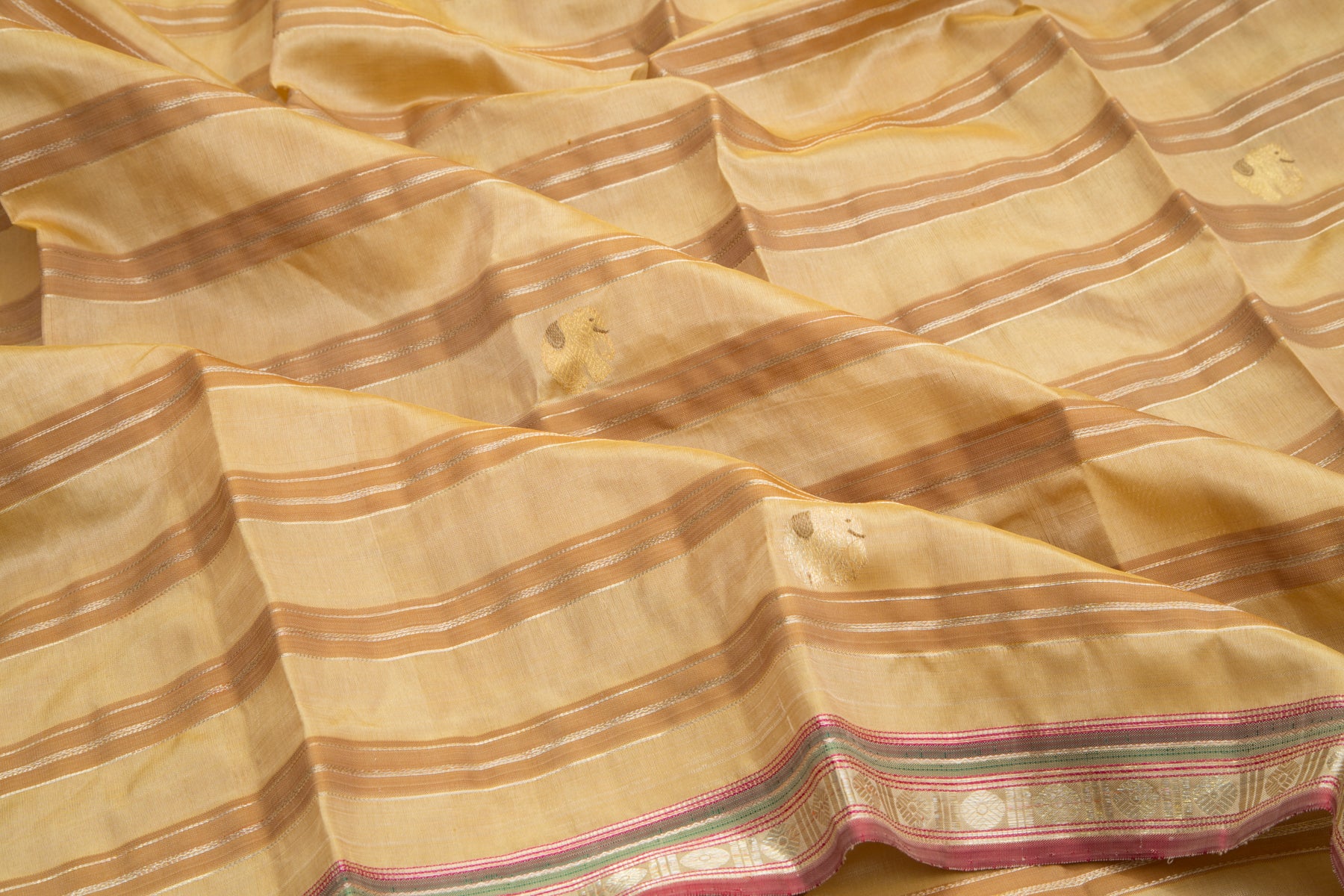 Kanchipuram Silk Horizontal Lines And Butta Cream Saree
