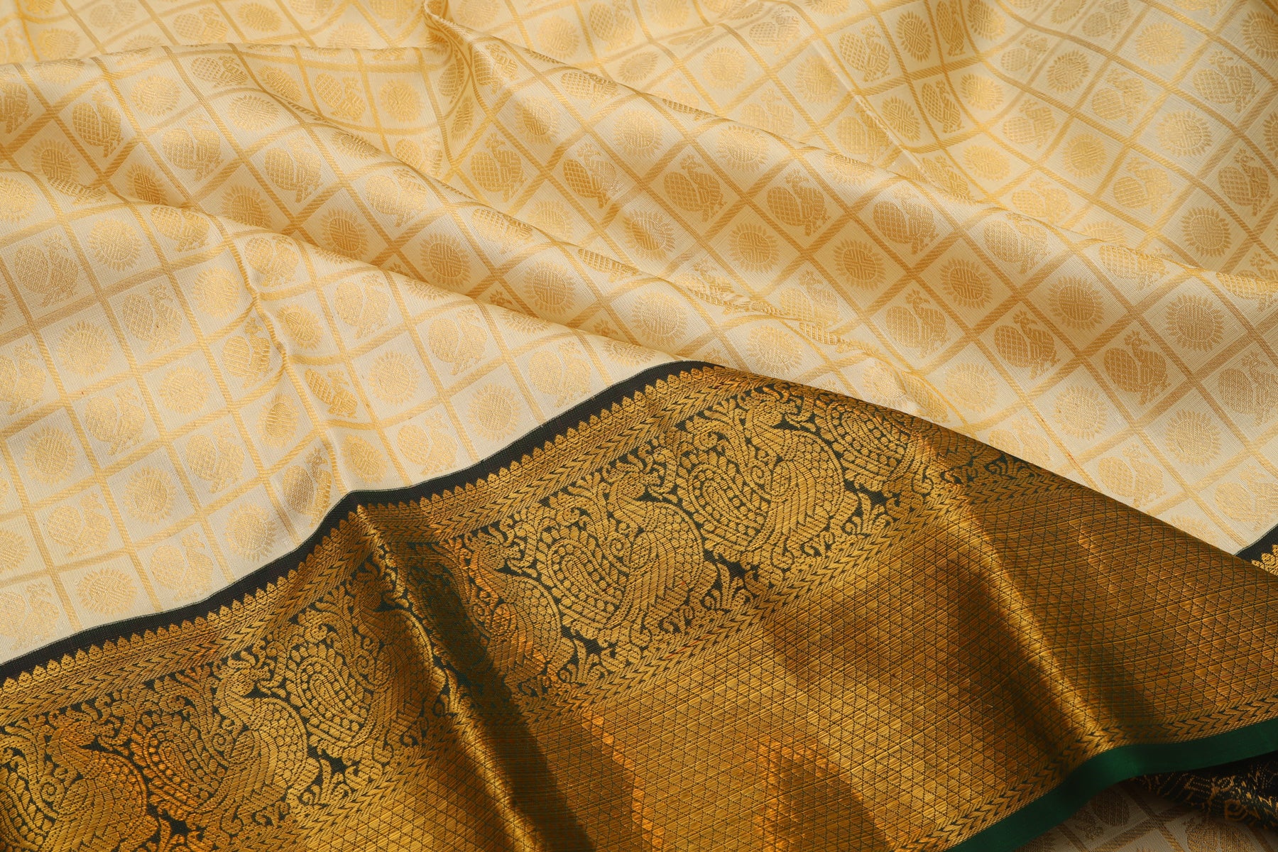 Kanchipuram Silk Checks And Butta Cream Saree