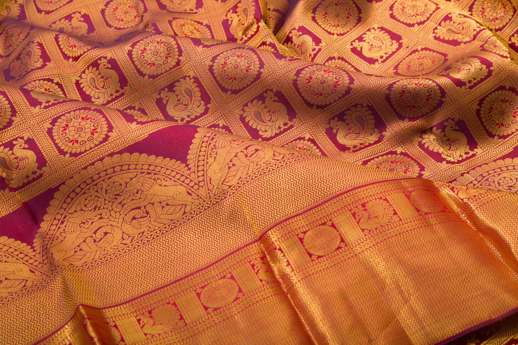 Kanchipuram Silk Checks And Butta Burgundy Saree