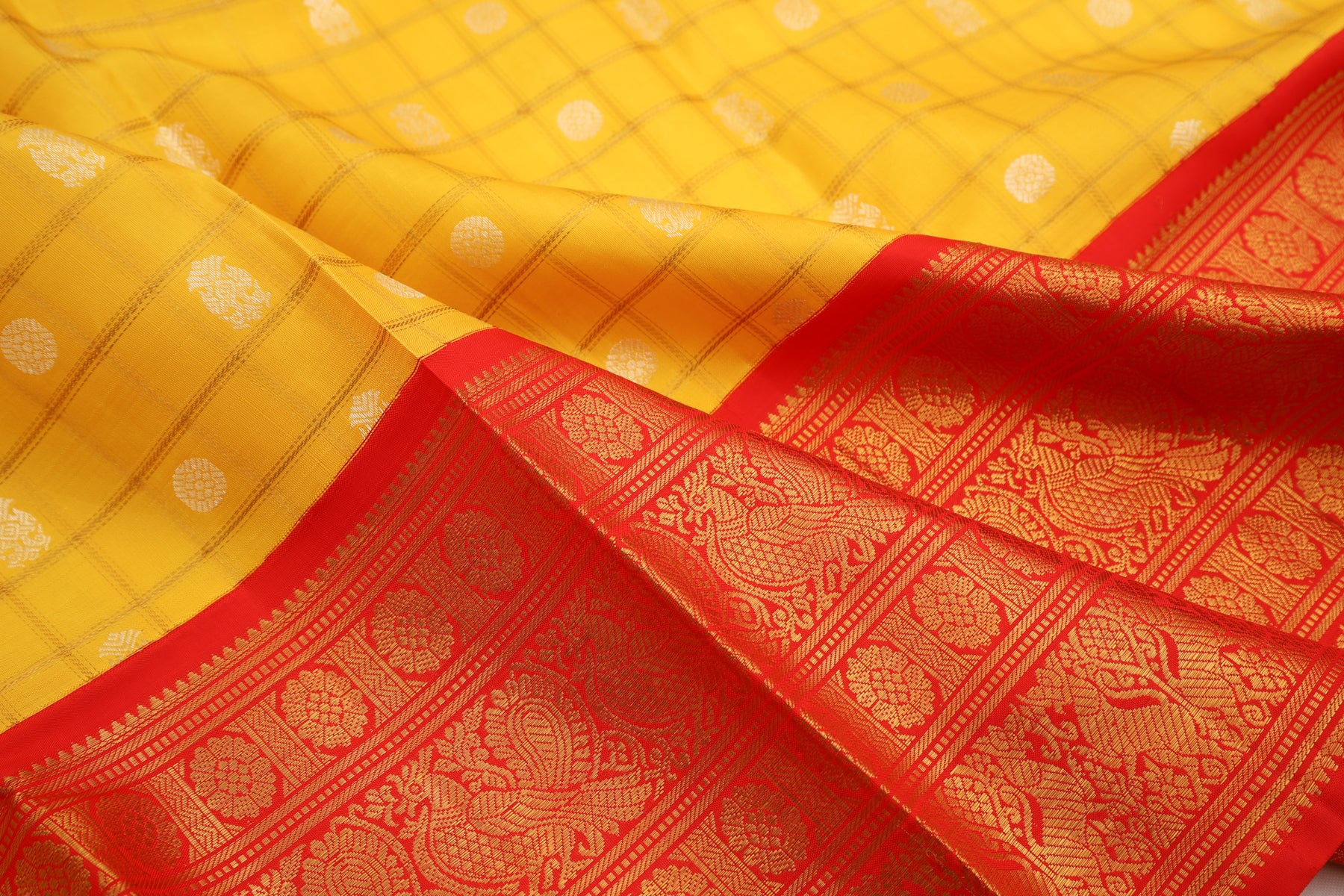 Kanchipuram Silk Checks And Butta Yellow Saree