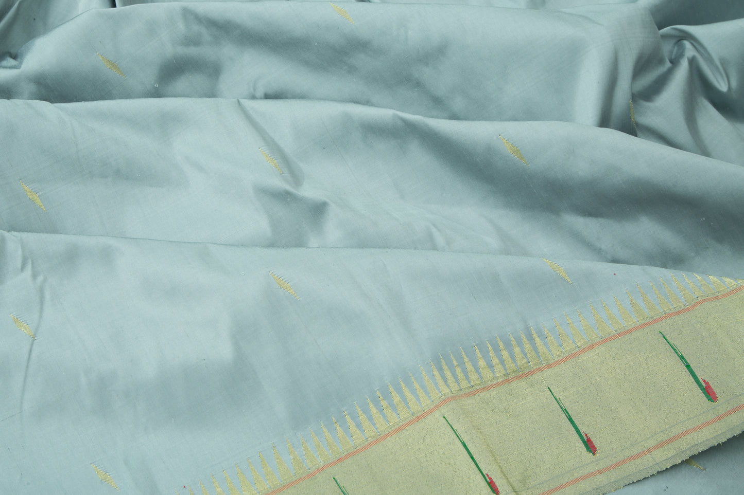Paithani Silk Butta Pastel Grey Saree With Muniya Border