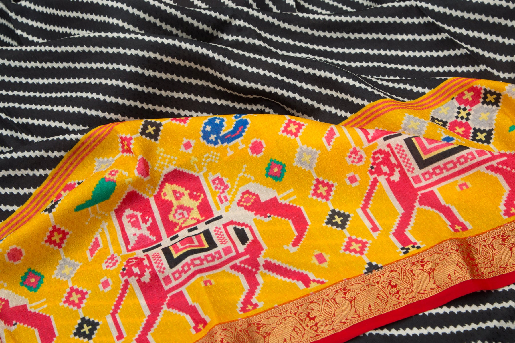 Kanchipuram Silk Jacquard And Ikat Style Printed Black Saree