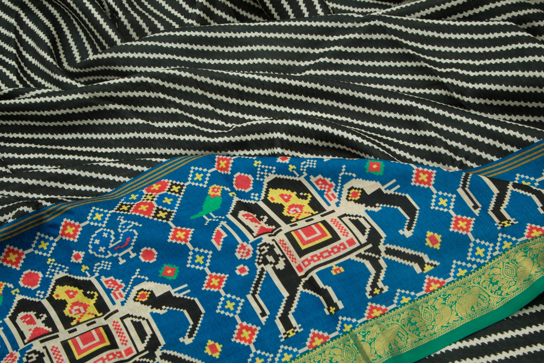 Kanchipuram Silk Jacquard And Ikat Style Printed Black Saree