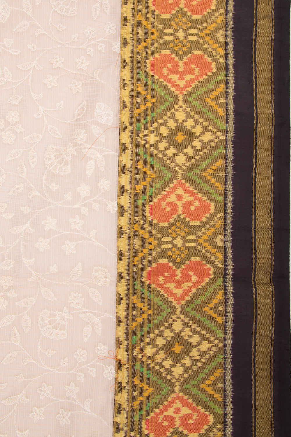 Kota Silk Tissue Floral Embroidery Cream Saree With Attached Ikat Border And Pallu