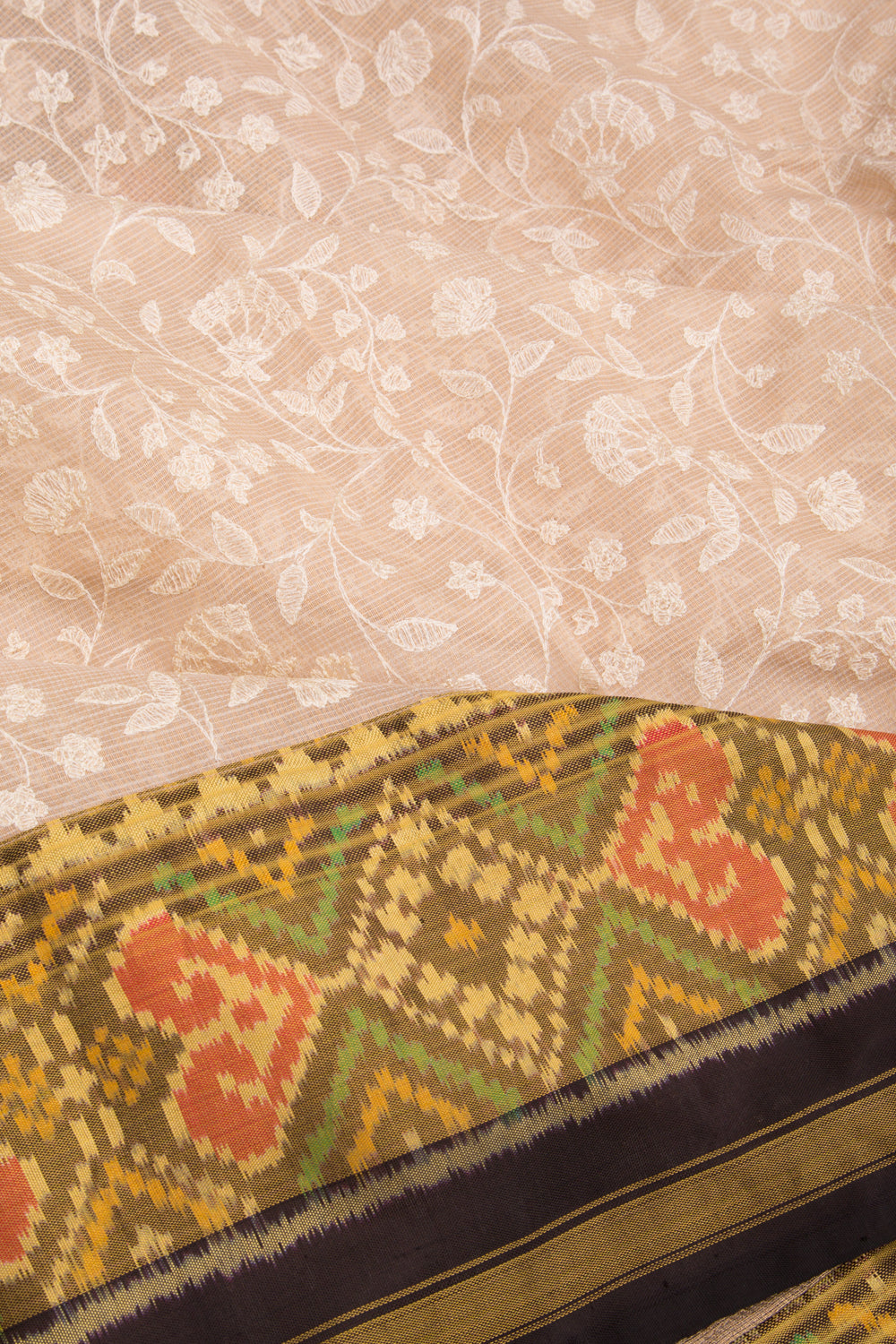 Kota Silk Tissue Floral Embroidery Cream Saree With Attached Ikat Border And Pallu