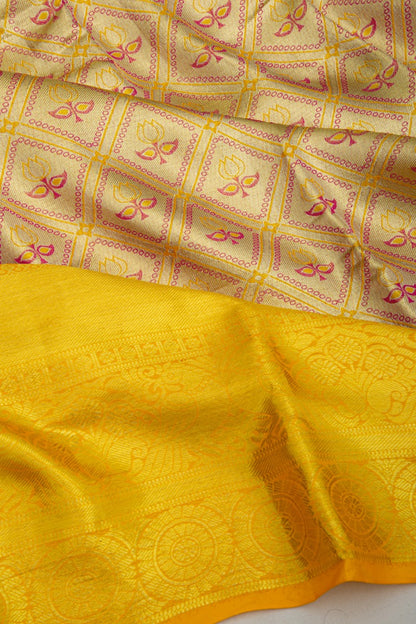 Taranga Kanchi Silk Tissue Brocade Gold Saree