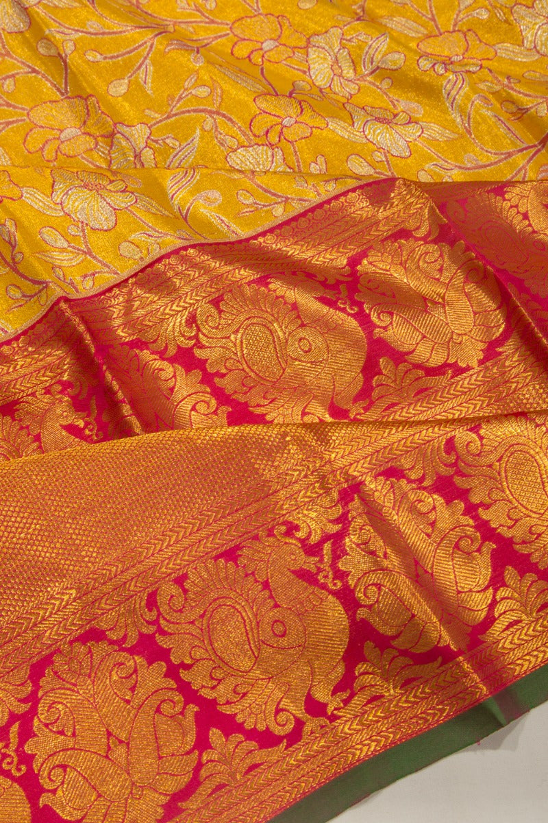 Taranga Kanchi Silk Tissue Jaal Yellow Saree