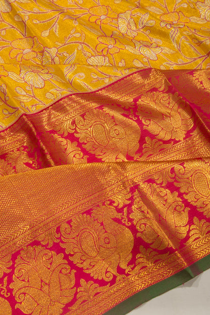 Taranga Kanchi Silk Tissue Jaal Yellow Saree