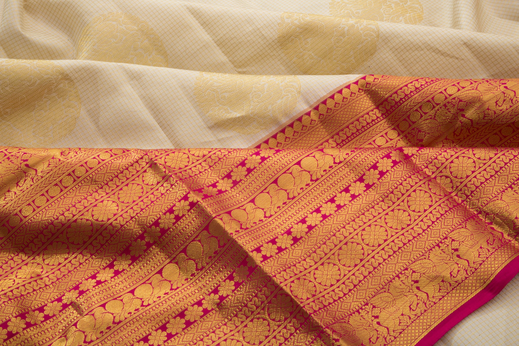 Kanchipuram Silk Checks and Butta Cream Saree