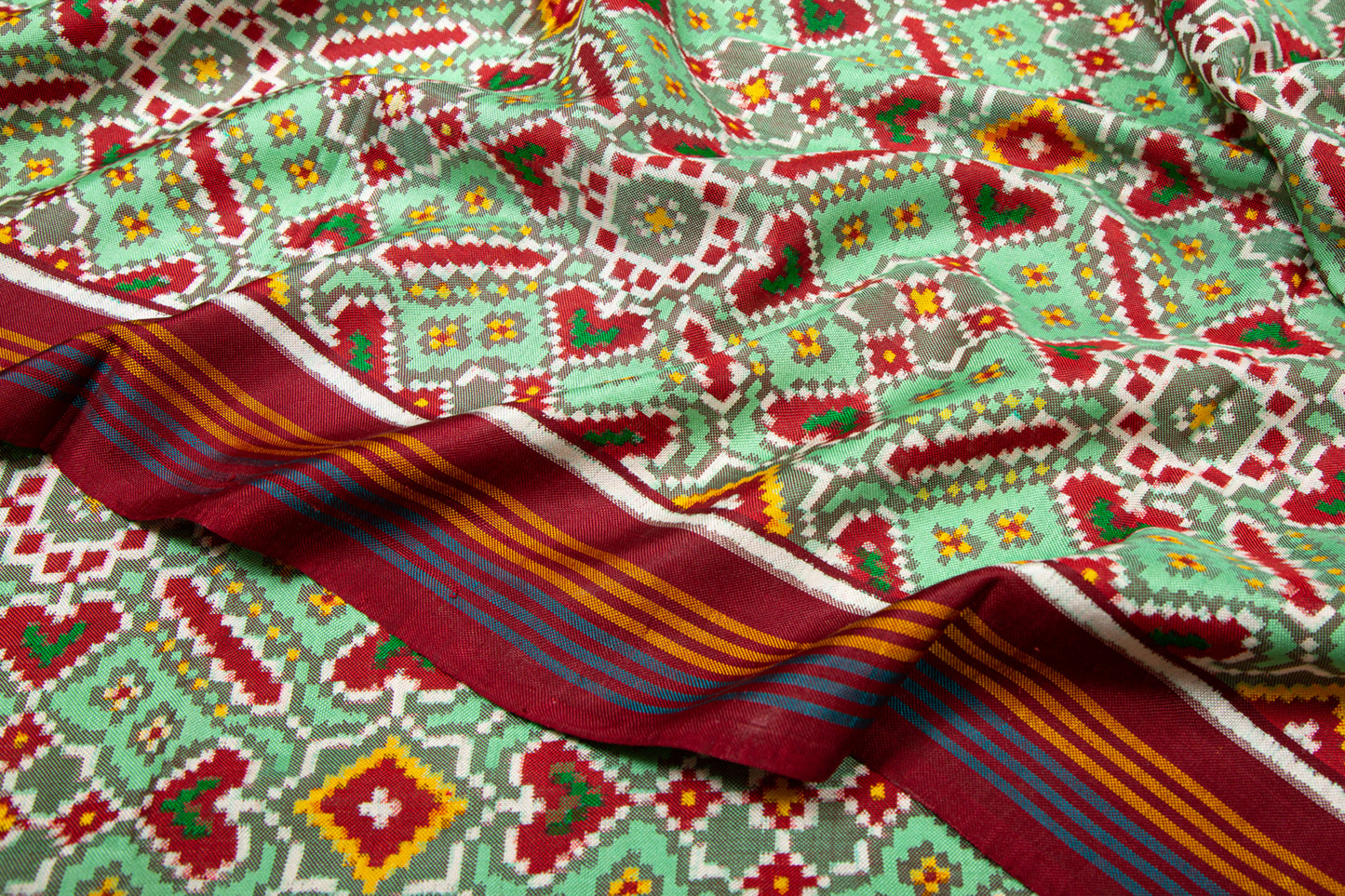 Patan Patola Silk Ikat Paan Bhat Pastel Green Saree