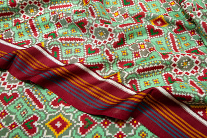 Patan Patola Silk Ikat Paan Bhat Pastel Green Saree