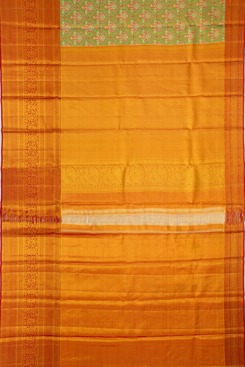 Taranga Kanchi Silk Tissue Brocade Green Saree