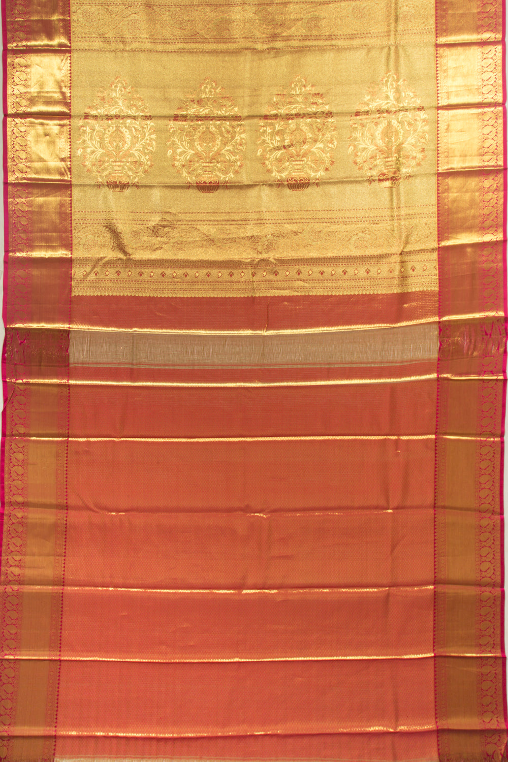 Taranga Kanchi Silk Tissue Brocade Gold Saree