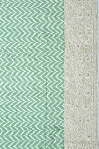 Semi Patan Patola Silk Ikat Green Saree With Chikankari Border