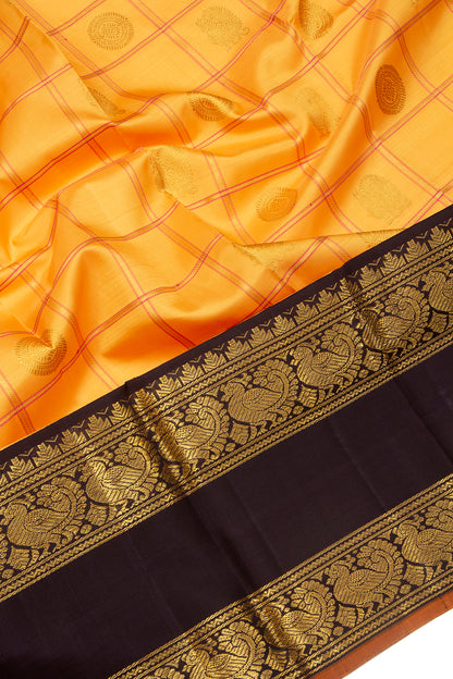 Kanchipuram Silk Checks And Butta Yellow Saree