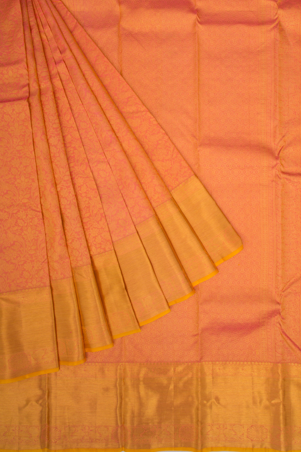 Taranga Kanchi Silk Jaal Pinkish Orange Saree